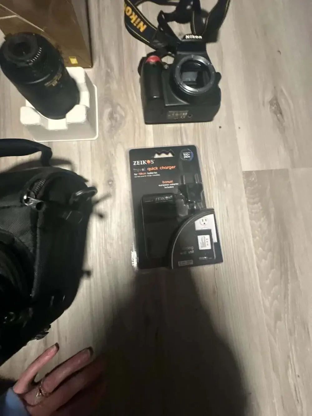 Nikon D3000 DSLR Camera Bundle with 55-200mm Lens and Bag